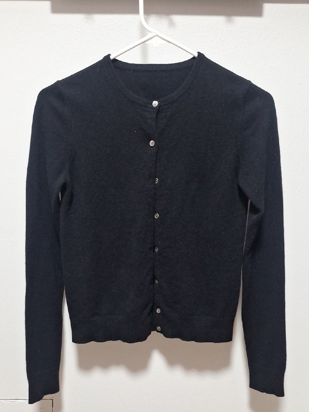 100% cashmere black button-down sweater, size small.